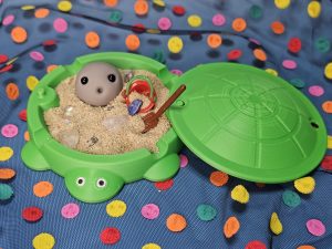 Sandkasten für Haussteine